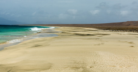 Fototapeta na wymiar Beach on uninhabited cape verde island (cabo verde), Santa Luzia. Strong winds and overcast sky.