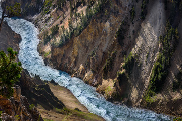 Mountain river. Yellowstone mountain waterfall river landscape, closeup.