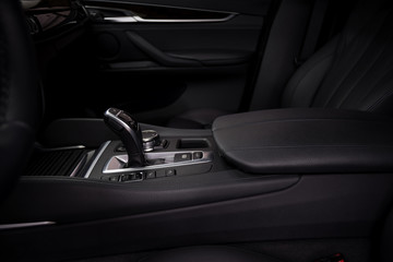 Gear shift in modern car. Interior detail.