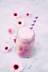 Healthy smoothie in a glass bottle