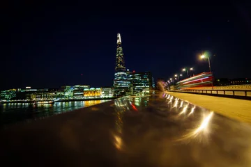 Foto op Plexiglas London Bridge with a red bus rushing past © Nicholas
