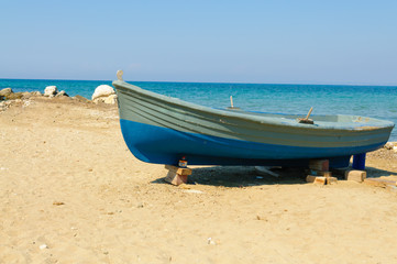 Fototapeta na wymiar Rowing boat on a beach on the Greek island of Zakynthos
