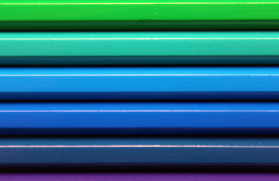 Horizontal color pencils gradient spectrum texture in a box