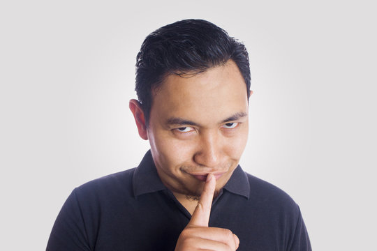 Funny Asian Man Close Up Sssh Gesture
