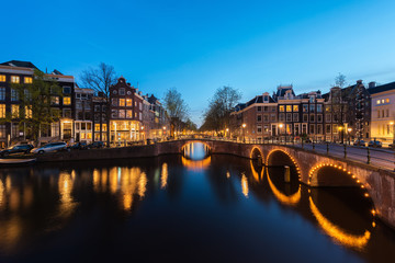 Obraz premium Canals of Amsterdam at night. Amsterdam is the capital and most populous city of the Netherlands.