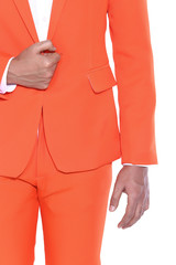 Orange Suit with shoulder and arm of Businessman, white shirt, isolated on studio lighting white background