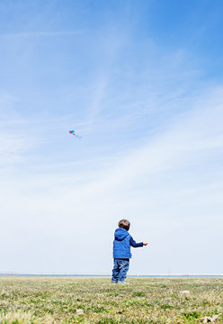 Boy Flying A Kite