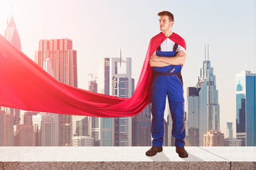 Janitor In Superhero Costume Standing On Top Of Building