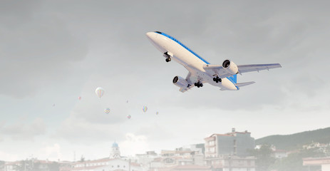 Naklejka premium Airliner in sky. Mixed media