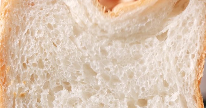 Handing pressing white bread