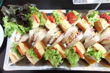 Mini Club Sandwich with chicken beacon ham, Egg Salad Cold Cuts Brioche Sandwiches for Catering, Seminar, Coffee Break, Breakfast, Lunch, Dinner, Buffet and meeting Group.