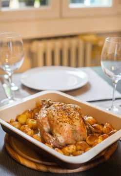 Roast chicken with potatoes