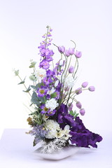 Obraz na płótnie Canvas Bouquet of Artificial Flower Colorful, white background