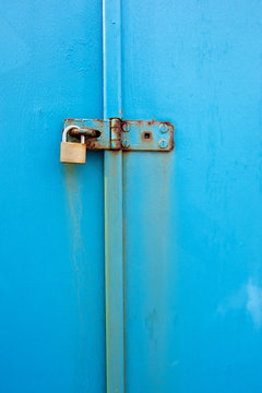 Padlock on a Blue Door