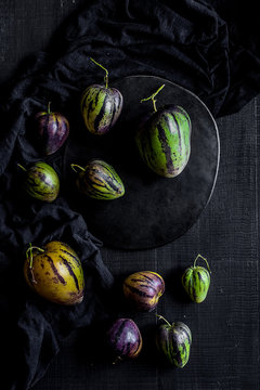 Pear-melons on a wooden  table