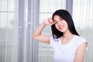 happy woman thinking with window background