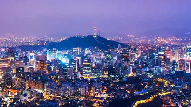 Cityscape of Seoul with Seoul tower at night, South Korea. Zoom in