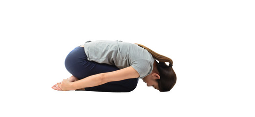Young asian woman practicing yoga, sitting in easy pose on white background.