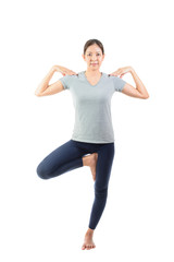 Young asian smiling woman practicing yoga, standing in easy pose on white background.