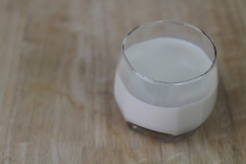Milk in glass bottles, closeup, background