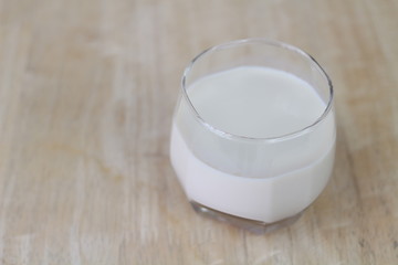 Milk in glass bottles, closeup, background