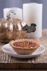 A pecan pie - traditional American pie for Thanksgiving. 