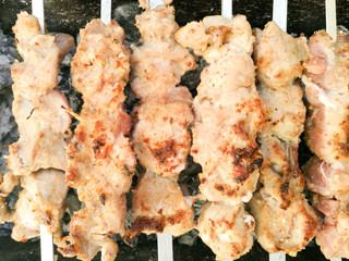 Shish kebab on metal sticks roasted on the grill