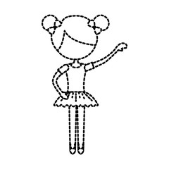 the little girl danced ballet with tutu dress and bun hair
