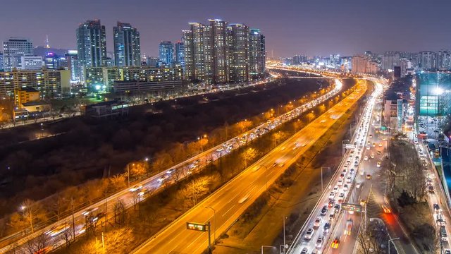 Time lapse traffic at night in Seoul, South Korea. Pan (4K)