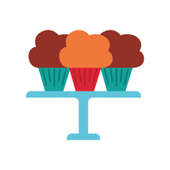 three birthday cupcakes arranged on a serving tray