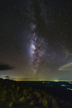 Milky way galaxy with knob stone ground is name Lan Hin Pum viewpoint at Phu Hin Rong Kla National Park in Phitsanulok, Thailand