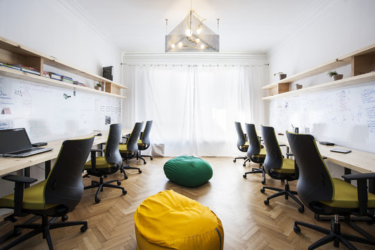 Interior view of modern office with empty chairs
