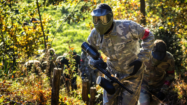Paintball team running