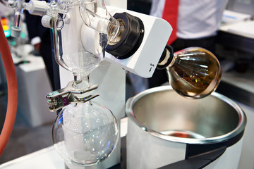 Laboratory rotary evaporator with chemical preparation in flask