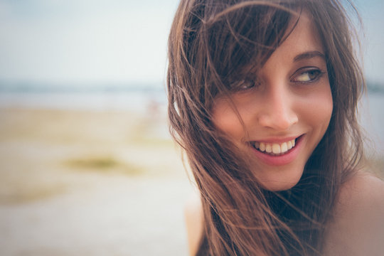 Smiling Woman on the Beach