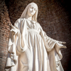 White stone statue of saint Mary