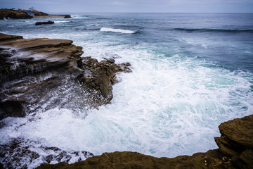 Fototapeta premium Waves hit San Diego coastline