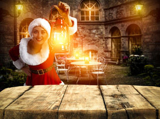desk and santa claus woman with lamp 
