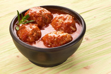Meatballs with tomato sauce in a pot