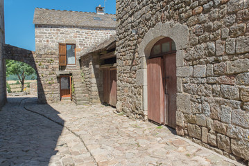 La Garde-Guerin, fortified village in Lozere, old houses, in the Cevennes in France 
