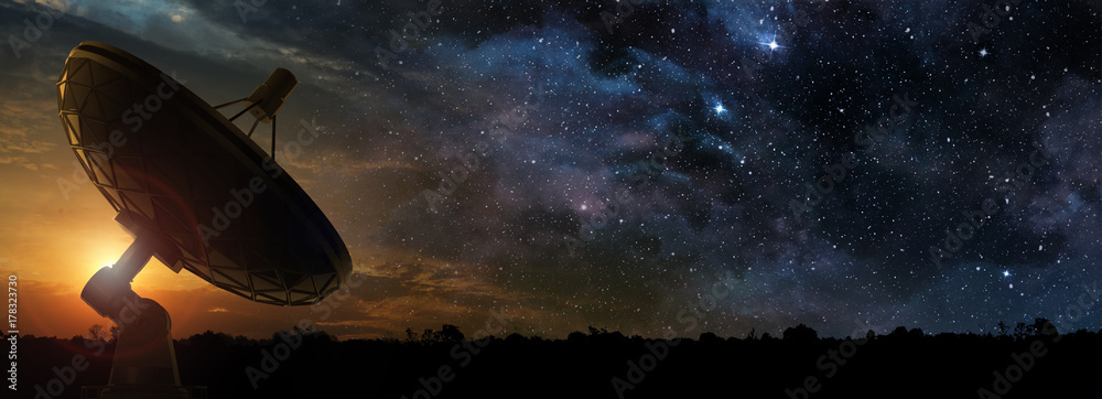 Wall mural radio telescope at the dawn of a starry night