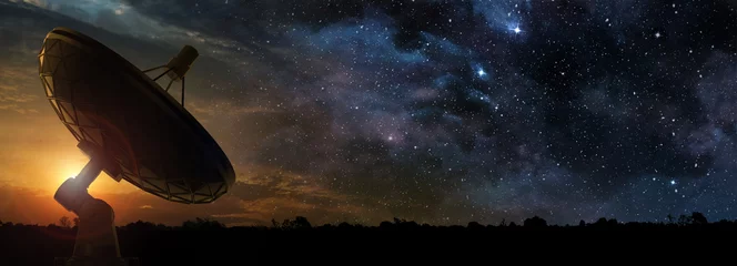 Fototapeten radio telescope at the dawn of a starry night © Paulista