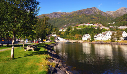 Waterfall in Hellesylt, a small town at the entrance to Geirangerfjord on a sunny summer day