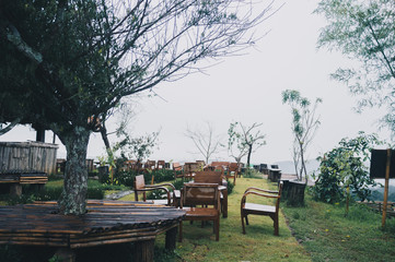 The terrace in forest on rainy day. Outdoor barbecue place and pavilion with natural view in mountain.