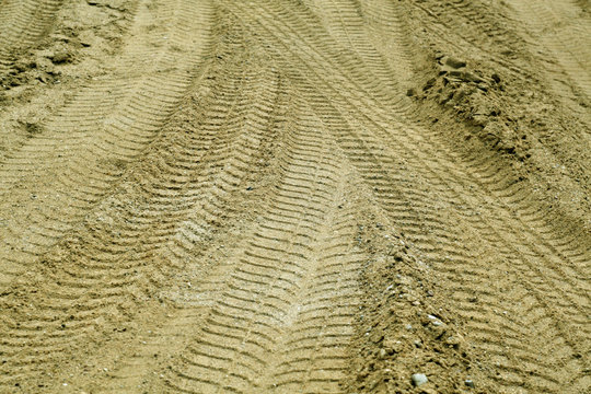 tyre tracks on sand.