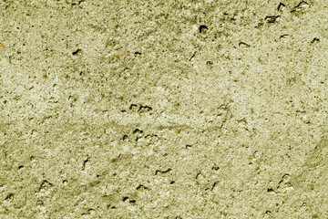 Yellow color grungy cement wall pattern.