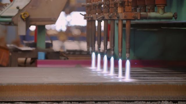 Multiple autogenous cutters cutting steel