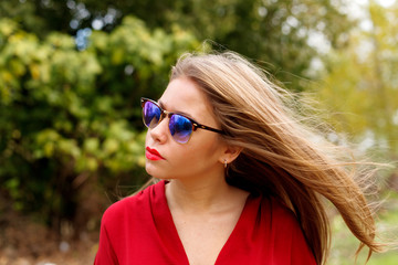 Pretty blonde girl with sunglasses