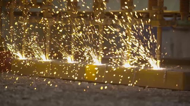 Multiple autogenous cutters cutting steel