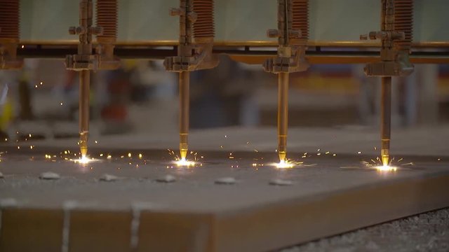 Multiple autogenous cutters cutting steel